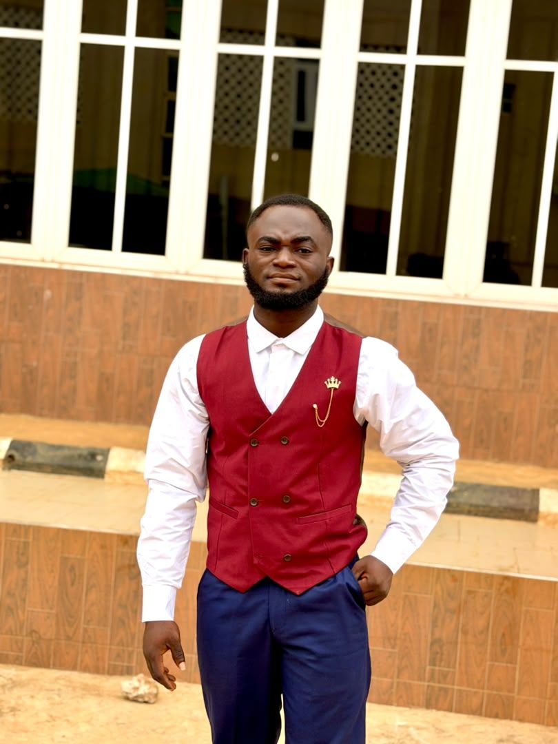 Taiwo Emma O standing outdoors